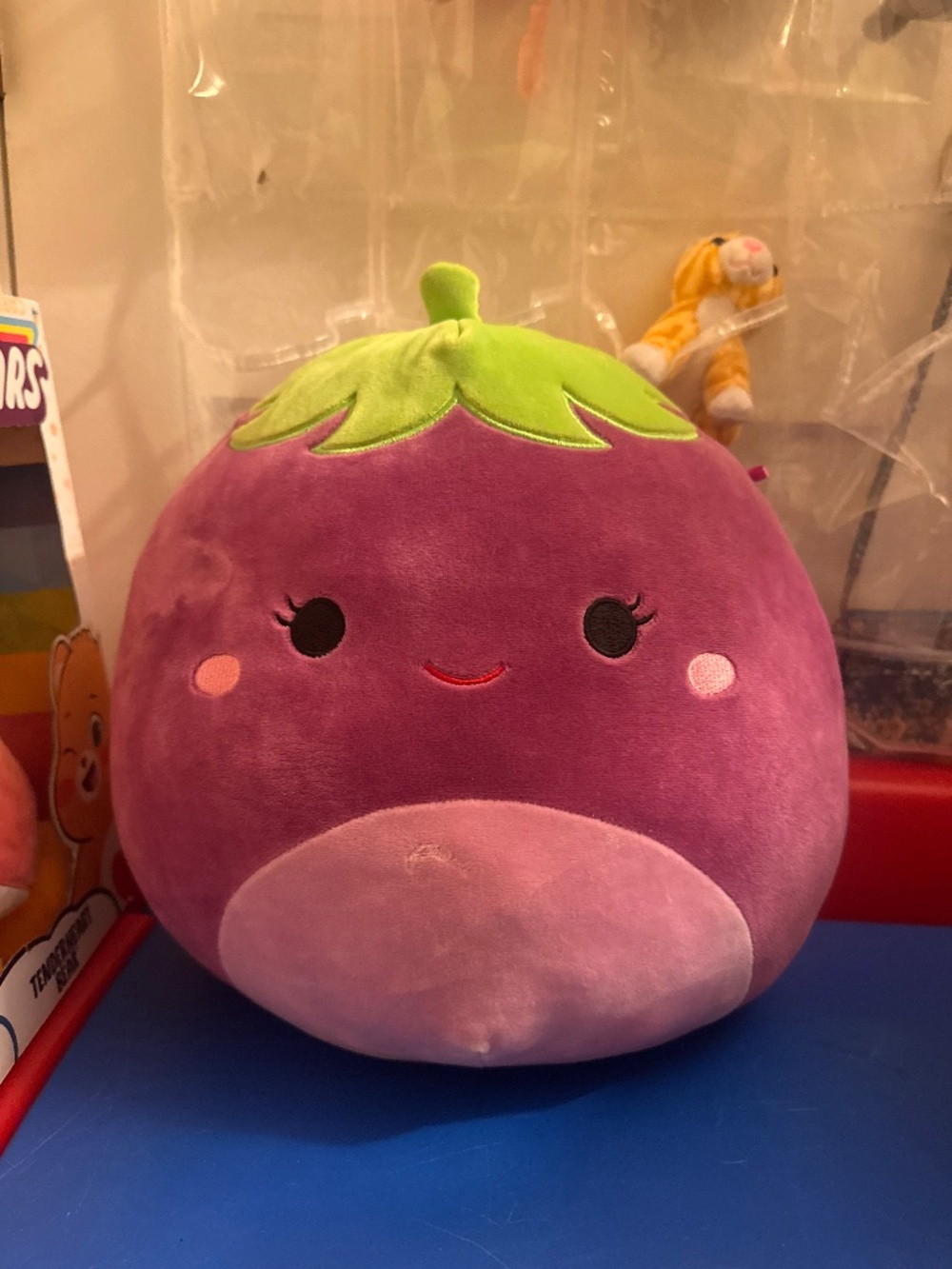 Squishmallows Glena the Eggplant plush toy, part of the Fruits and Vegetables Sq